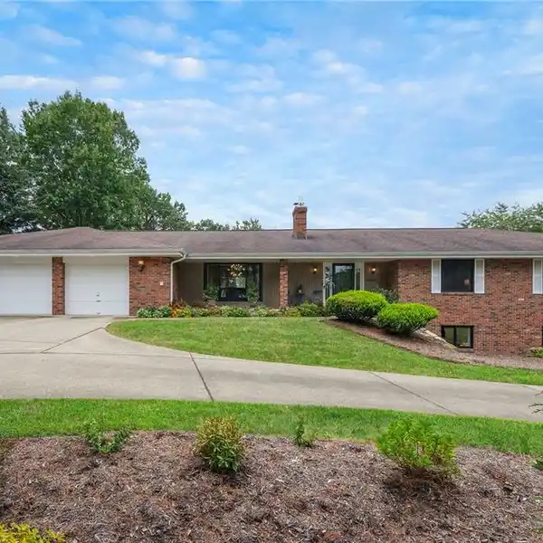 STUNNING AND SPRAWLING BRICK RANCH