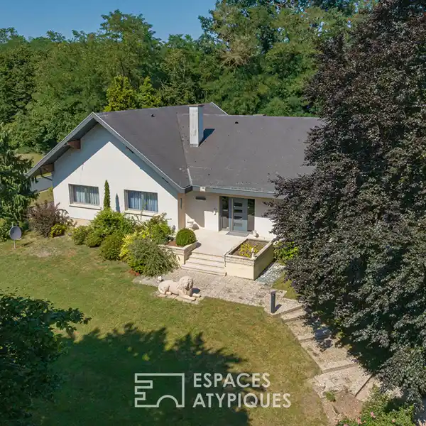 RETRO 1970S HOME ON EXPANSIVE FOREST-EDGE LOT