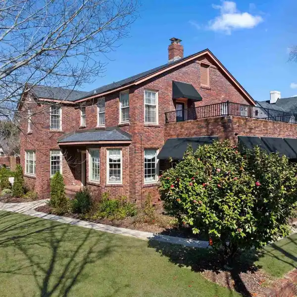 TUDOR-STYLE BRICK POOL HOME IN HISTORIC EAST HILL