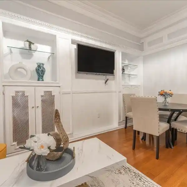 BEAUTIFULLY RENOVATED THREE-FAMILY TOWNHOUSE