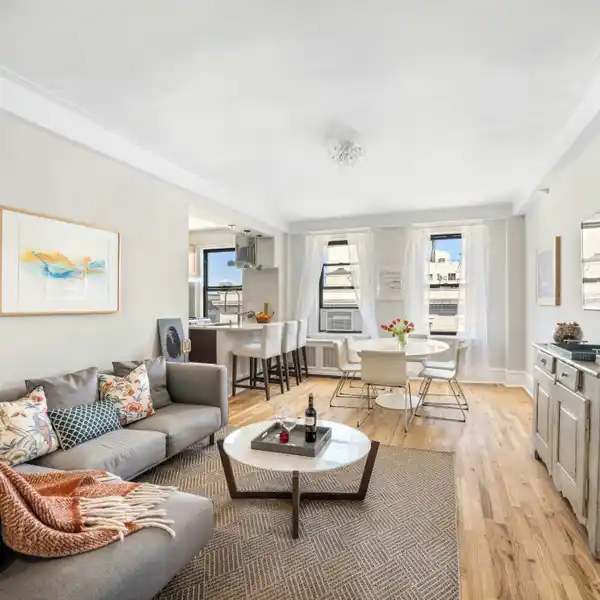 RENOVATED TOP-FLOOR CORNER HOME
