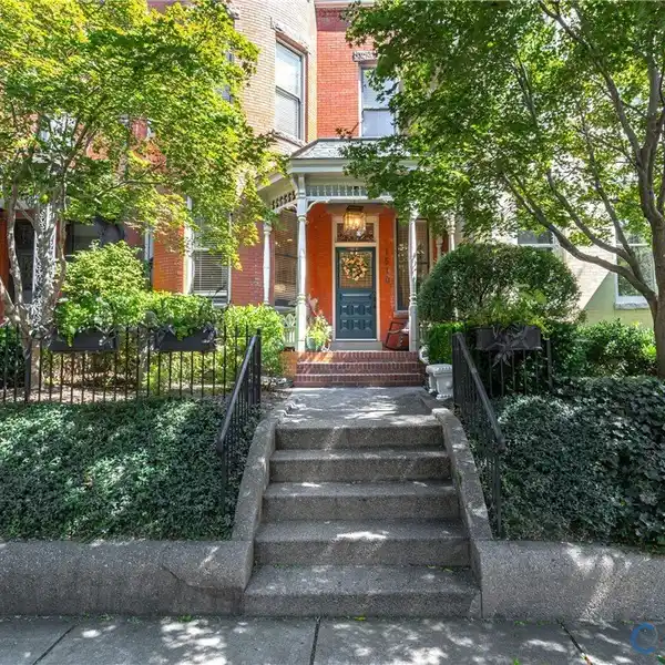 DISTINGUISHED 3 STORY BRICK ROW HOME