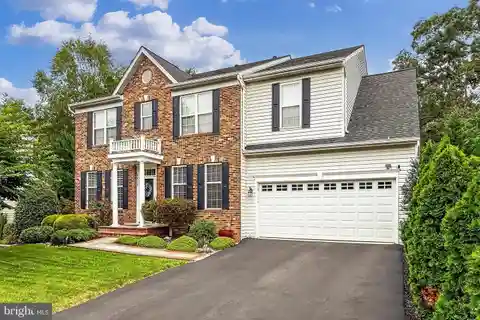 Impeccable Brick-Front Colonial in Prime Location