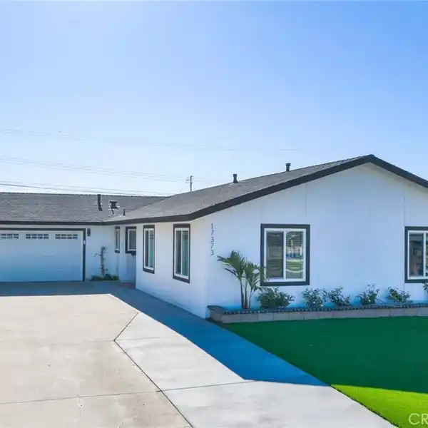 TWO STUNNING SINGLE-STORY HOMES ON ONE LOT
