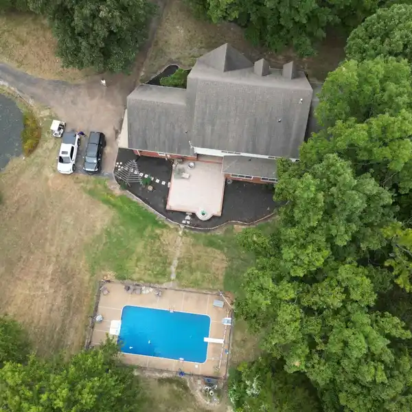 FIVE BEDROOM HOME IN A WOODED SETTING