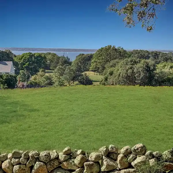 CHARMING COTTAGE ON 1.2 ACRES