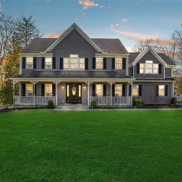 STUNNING COLONIAL WITH EXPANSIVE DECK