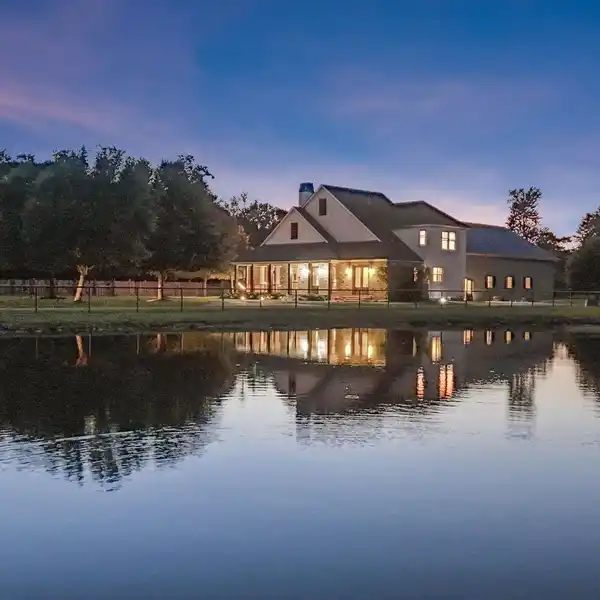 SECLUDED FARMHOUSE ON 17+ ACRES