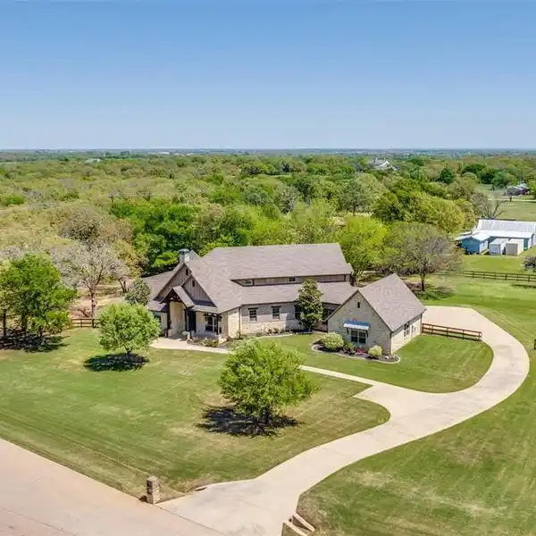 IMMACULATELY MAINTAINED CUSTOM HOME ON TWO ACRES