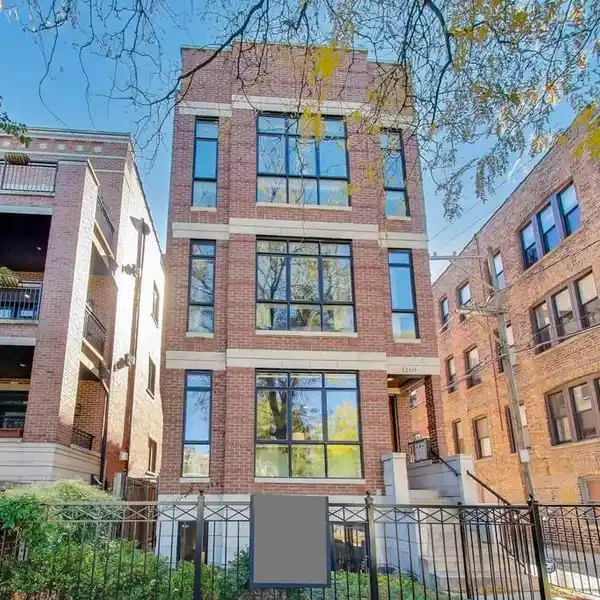 EXQUISITE BRICK DUPLEX WITH SOPHISTICATED ENTERTAINING SPACES