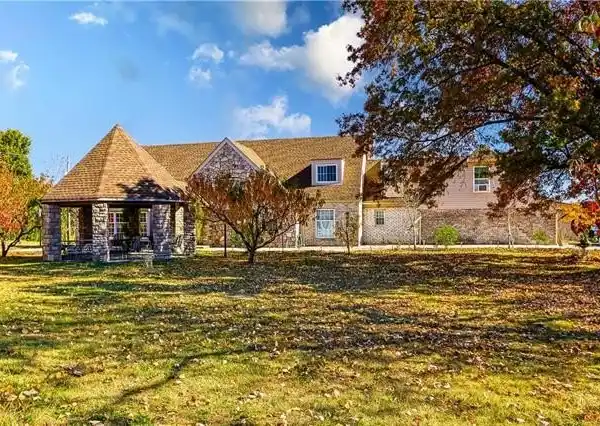 EXPANDED CUSTOM BUILT TUDOR STYLE CAPE