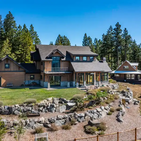 TWO HOMES ON 100-PLUS PRIVATE ACRES