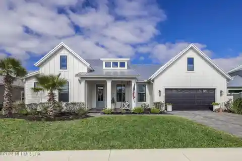 Elevated Coastal Living with Unmatched Amenities