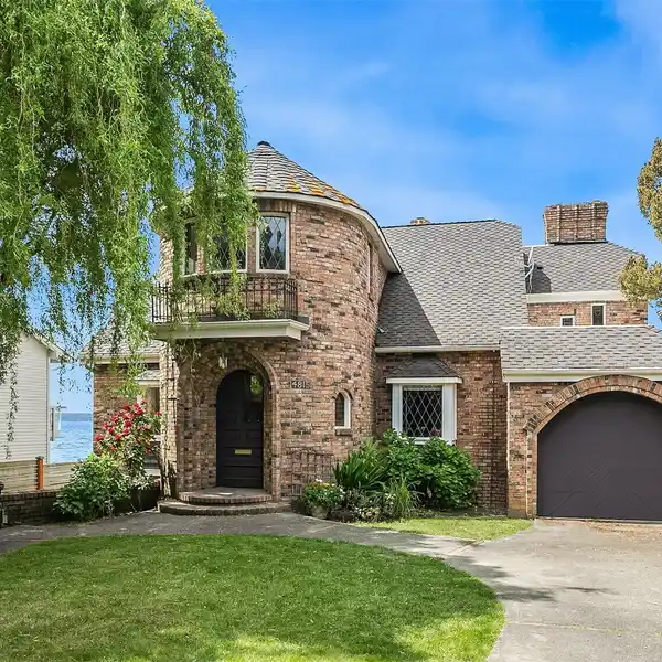 THE ICONIC CASTLE ON WEST SEATTLE'S COVETED BEACH DRIVE