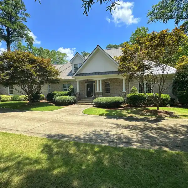 EXCEPTIONAL ESTATE HOME IN A STORYBOOK POND SETTING