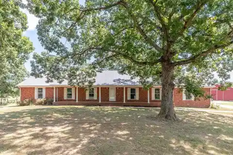 Expansive 25-Acre Homestead with Pool and Orchard
