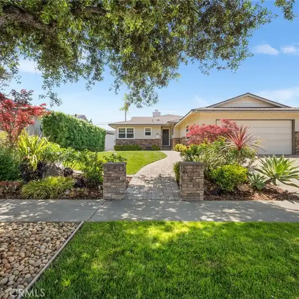 ENTERTAINER’S DREAM WITH LUSH BACKYARD OASIS