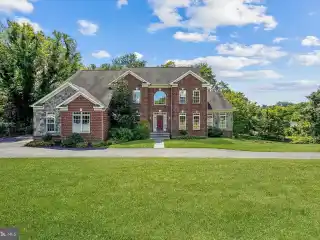 Expansive Brick and Stone Front Colonial