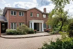 EXQUISITE HOME ON A TREE-LINED STREET