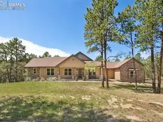 Custom Beauty on 2.5 Acres in Gated Black Forest Reserve