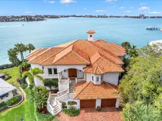 Waterfront Masterpiece in Prestigious Oakhurst Shores