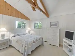 Lakefront Elegance with Docks, Beach, and Views