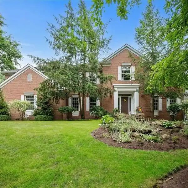 GRAND BRICK COLONIAL IN PRESTIGIOUS NEIGHBORHOOD