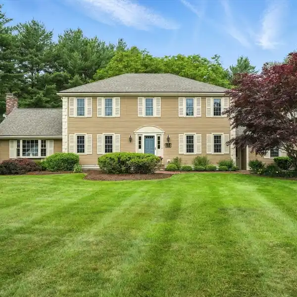 CLASSIC COLONIAL ON A BEAUTIFUL CORNER LOT