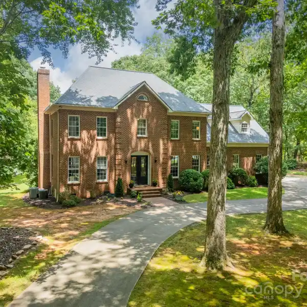 ELEGANT ALL-BRICK ESTATE ON FIVE SERENE ACRES