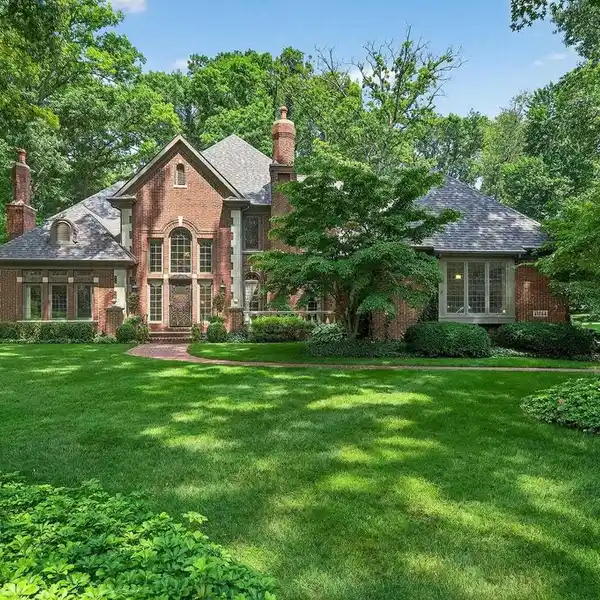 ELEGANT CUSTOM BRICK HOME ON WOODED CUL-DE-SAC