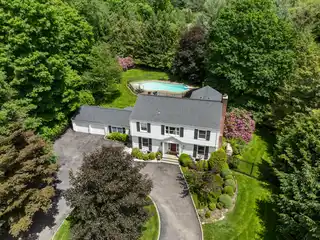 Expanded Colonial Home Blending Luxury and Charm