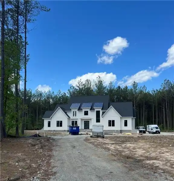 ONE-OF-A-KIND CUSTOM ESTATE ON FIVE SECLUDED ACRES