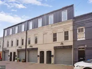 Sleek Sanctuary with Rooftop and Garden Escape
