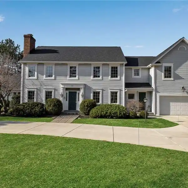 EXQUISITE COLONIAL HOME ON A MANICURED LOT