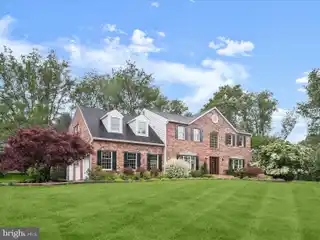 Timeless Colonial with Lush Garden Oasis