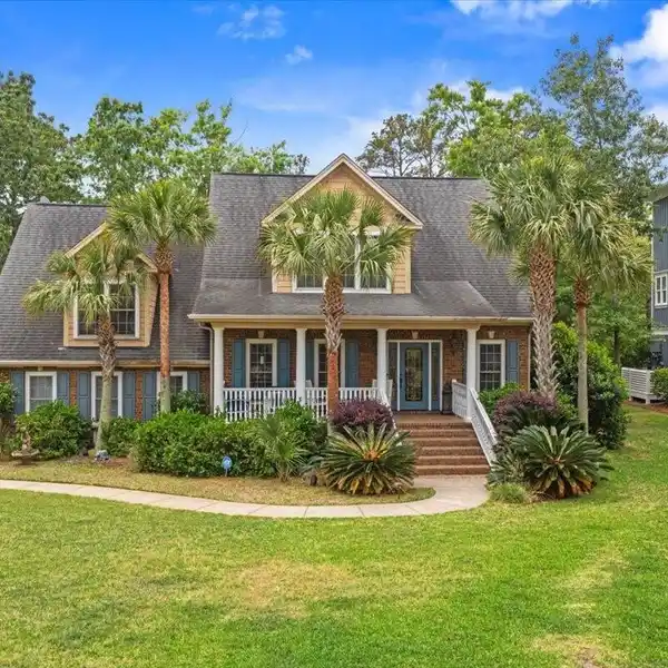 CUSTOM BRICK HOME IN DUNES WEST