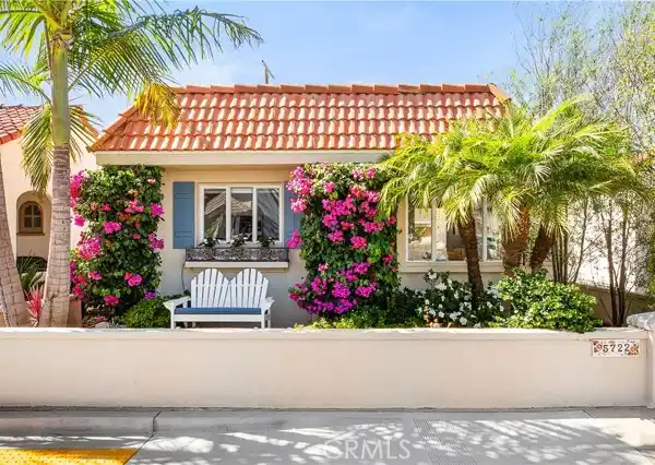 REMODELED BEACH COTTAGE WITH COURTYARD ELEGANCE