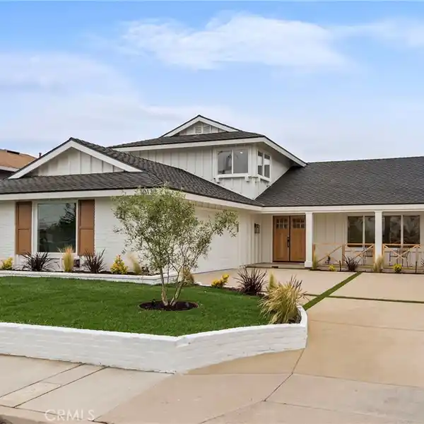 TIMELESS COASTAL ELEGANCE  IN A COVETED NEIGHBORHOOD