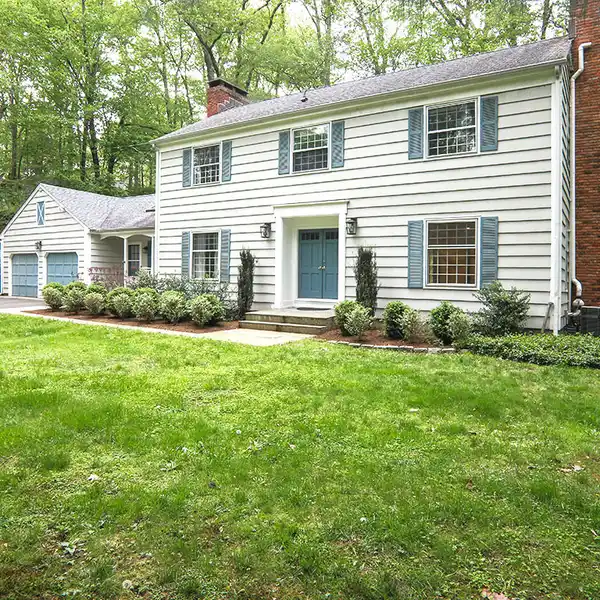 BEAUTIFULLY MAINTAINED COLONIAL ON A LOVELY ACRE