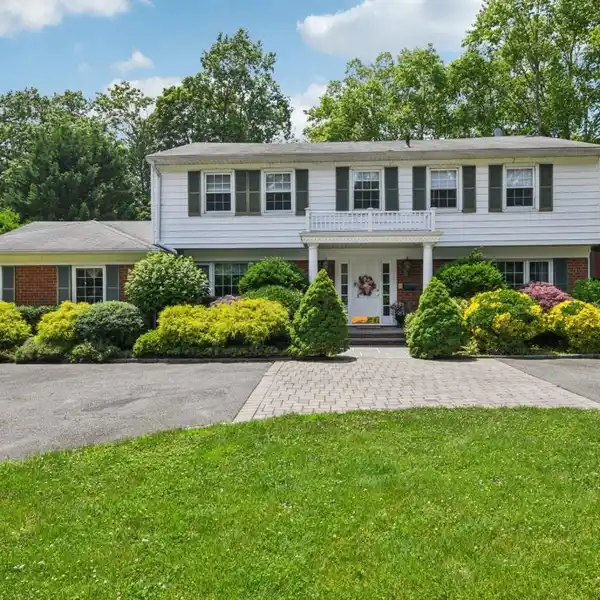 EXPANSIVE COLONIAL ON AN OVERSIZED LOT