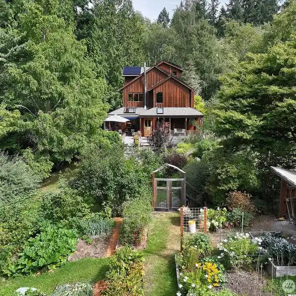 HANDCRAFTED WOODLAND SANCTUARY WITH TIMELESS NATURAL ELEGANCE