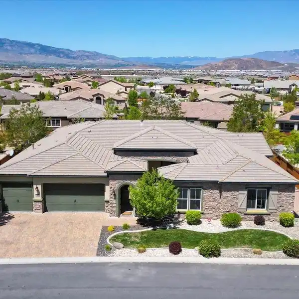 STUNNING HOME IN COVETED GATED COMMUNITY