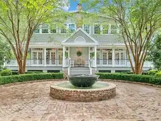Craftsmanship and Charm on Expansive Oak-Spotted Estate