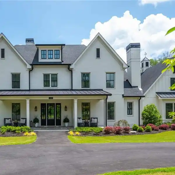 SECLUDED ACREAGE WITH GUEST SUITE AND CHARM