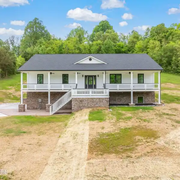 IMMACULATE NEW HOME ON 5.6 ACRES