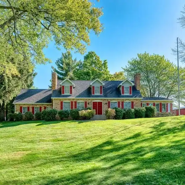 YOUR OWN YELLOWSTONE – CUSTOM ANTIQUE BRICK HOME ON 60 ACRES