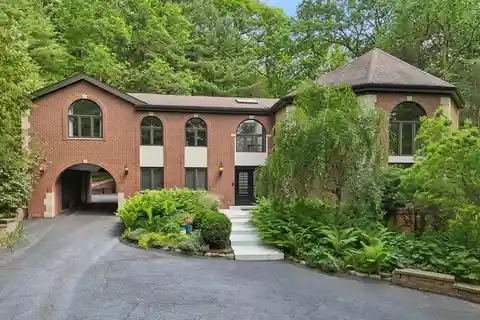Massive Single Family Home Surrounded by Foliage