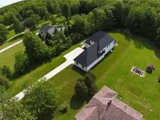 Bold New-Build with Acre of Wooded Privacy