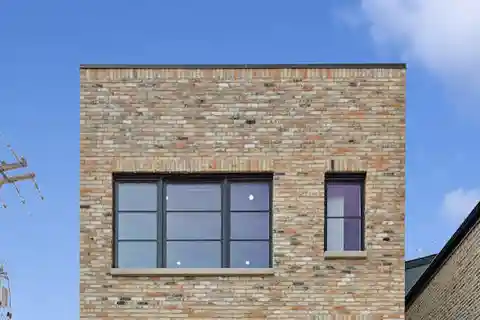 Custom Brick Beauty with Luxe Finishes Throughout