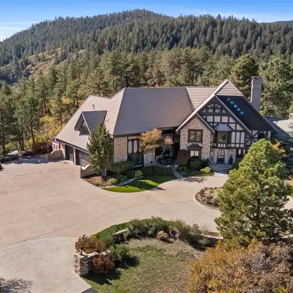 FULLY RENOVATED TUDOR ESTATE ATOP 40 ACRES